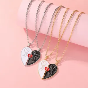 Matching broken heart couple necklaces set, stylish black and white drip oil pendant jewelry.