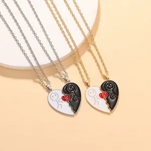 Charming couple split heart necklace set with enamel design, perfect detail shot.