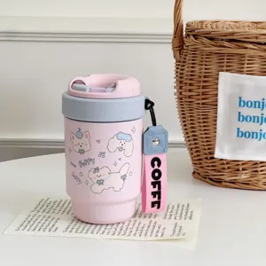 Mini ceramic liner insulated coffee tumbler with cute puppy print and portable strap.