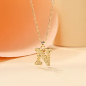 Gold-plated initial N pendant necklace, chic alphabet chain jewelry for daily fashion wear.
