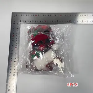 Detail von 6 rot-schwarz karierten Weihnachts-Weinflaschenhüllen mit Maßstab-Anzeige.