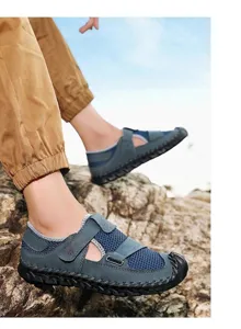 Detail view of breathable blue mesh men's sandals with manual stitching
