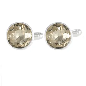 Detailed close-up of round crystal gemstone cufflinks featuring polished silver rim and facet stone.
