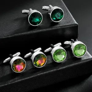 Detailed close-up of elegant round multi-color crystal gemstone cufflinks for formal shirts.