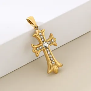 Gold stainless steel cross pendant detail, sparkling rhinestone inlaid necklace accessory.
