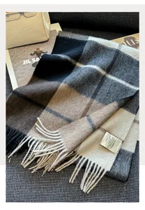 Classic wool plaid scarf for women, soft warm winter neck warmer with stylish fringe detail.