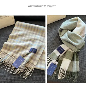 Detailed view of the cozy wool blend plaid scarf featuring soft texture and stylish fringe.