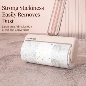 Lint roller pet hair remover tool with 10cm sticky paper roll for easy home cleaning tasks.