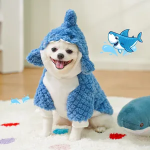 Detailed shot of a cute pet wearing a soft fleece shark costume, warm and funny design for dogs.
