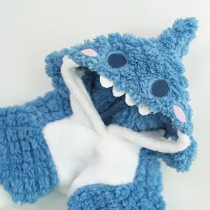 Cute blue fleece pet costume detail shot, fluffy material with adorable animal hood design.