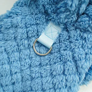 Blue fluffy pet clothing detail with metal D-ring for leash attachment winter dog warm puppy apparel