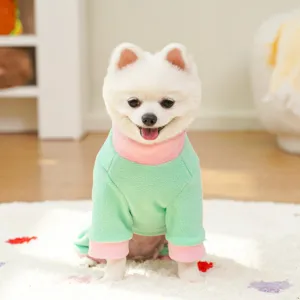 Detailed view of the cute pet fleece sweater in green and pink, soft winter wear for dogs.