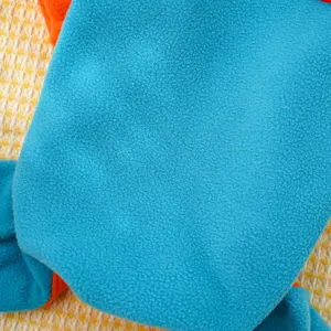 Pet fleece apparel detail, blue and orange color block design, warm pet winter clothing.