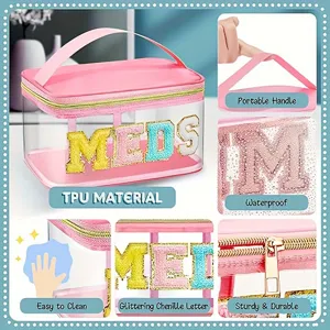 Sac cosmetique transparent en TPU avec lettres chenille MEDS, poignee et design impermeable.