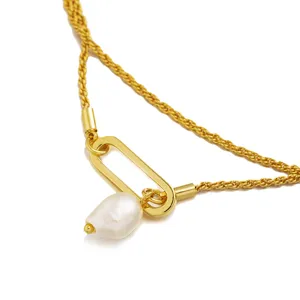 Retro gold brass layered necklace with baroque pearl pendant, minimalist sweater chain style.