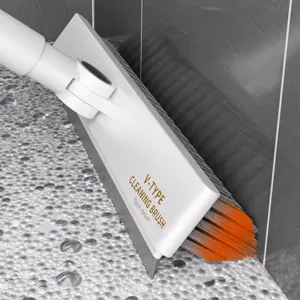 Long handle V-shaped floor gap cleaning brush for bathroom tile corners and grout lines.