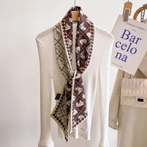 Elegant narrow silk wool scarf with chic equestrian geometric print, perfect stylish neckerchief.