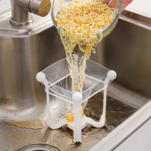 Kitchen sink drain rack with filter net for food waste residue storage and easy cleanup.