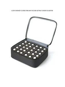 Detailed view of black travel storage bag with foam insert slots for essential oils and bottles.