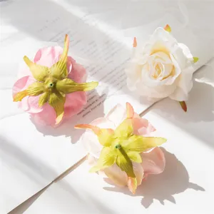 Artificial silk rose flower heads for wedding home decor and DIY crafts. Premium faux floral.