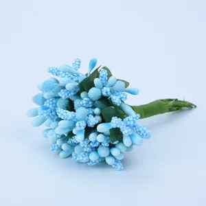 Blue artificial berry bouquet detail for DIY crafts, wedding candy boxes and wrist corsages.