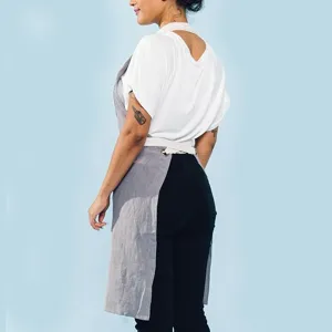 Grey cotton linen kitchen apron with cross straps, comfortable breathable workwear for cooking.