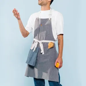 Premium cotton linen work apron with multi pockets and adjustable straps for daily cooking.