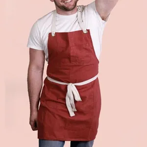 Comfortable cotton linen work apron with practical pockets and adjustable straps for daily use.