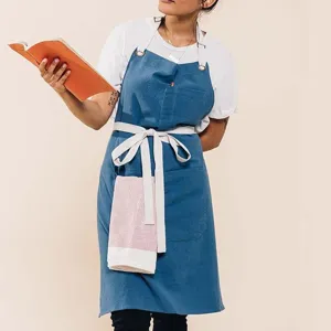 Cotton linen casual apron detail shot, breathable workwear with convenient pockets and straps.