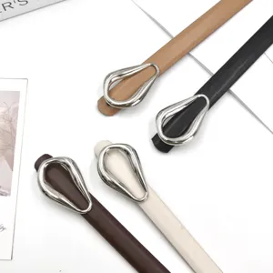 Women thin PU leather belt with unique horseshoe metal buckle, stylish dress waist accessory.