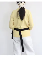 Dettaglio marsupio utility casual multifunzionale, borsetta nera alla moda per uso quotidiano.