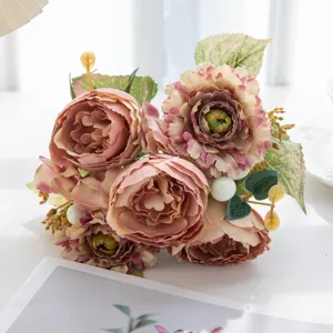 Artificial flower bouquet detail shot, vintage pink peony floral arrangement for home decor.