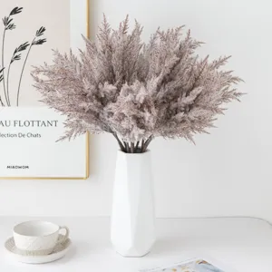 Artificial pampas grass bouquet with white ceramic vase for Nordic home decor and wedding.