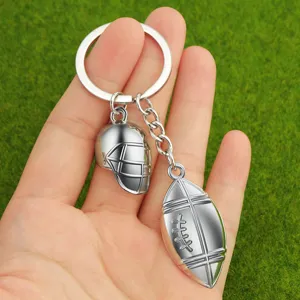 Metal American football helmet keychain pendant, creative gift keyring for sports fans.