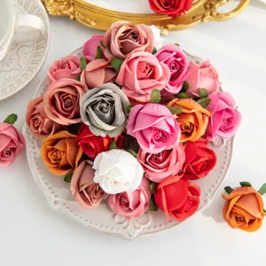 Artificial silk rose heads detail for DIY crafts, wedding decor and floral wall arrangements.