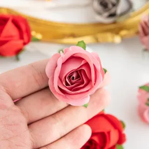 Artificial rose silk flower detail showing pink petal texture for DIY wedding floral decor