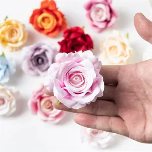 Artificial silk rose flower heads for DIY crafts, wedding decoration and photography props.