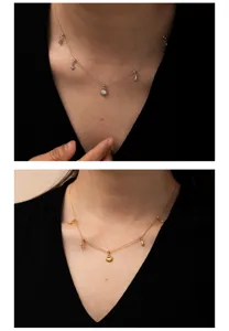 Detail view of multi-charm dainty necklace featuring shell and star pendants, chic jewelry.