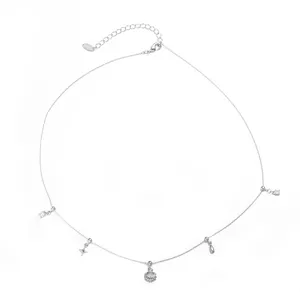 Silver multi-charm clavicle necklace with seashell and star pendants for women.
