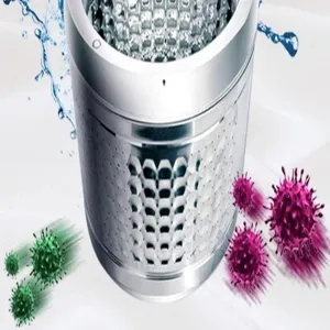 Washing machine inner drum stainless steel detail view, cleaning tool accessory display.