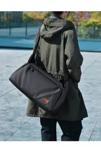 Black large capacity travel duffel bag for fitness and short trips with adjustable shoulder strap.