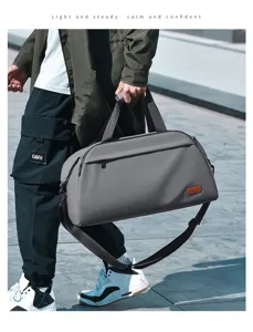 Large capacity travel duffel bag with shoulder strap for short business trips and fitness use.