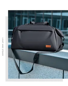 Detailed view of the black travel duffel bag showing durable fabric and spacious design.