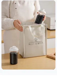 Flacone erogatore di liquido TCM in plastica portatile con scale di misurazione chiare.