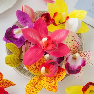 Artificial Cymbidium orchid flowers film petals for cake dessert table decor and ethnic headwear.