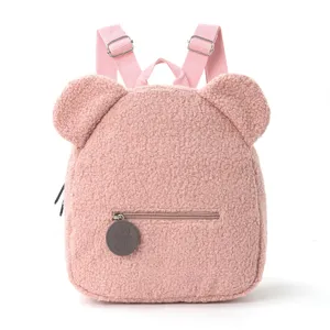 Cute pink fluffy teddy fleece backpack with cute bear ears for kids and casual daily use.