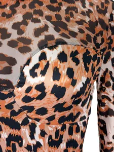 Detailed close-up showing the leopard print pattern and sheer mesh fabric texture