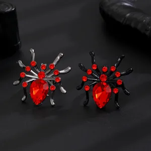 Exquisite gothic punk spider ring with red rhinestones for Halloween costume accessory.