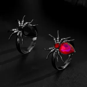 Gothic spider rings with vibrant red and black gemstones set in sparkling rhinestones