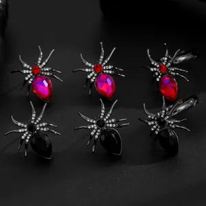 Group of punk spider rings with red and black crystals for Halloween jewelry